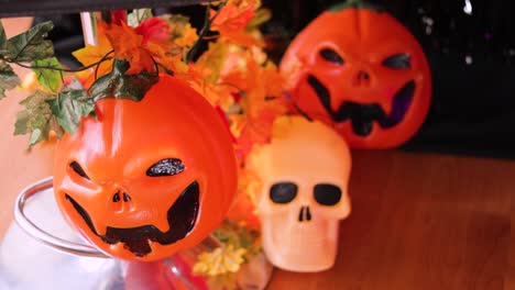 Angry-looking-pumpkins-and-skulls-serving-as-Halloween-decorations