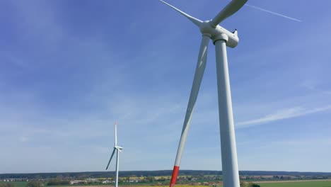 Emissions-free-power-generation-with-wind-turbine-in-the-countryside,-drone-view-video