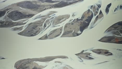 Drone-shot-of-some-glacial-rivers-in-Iceland