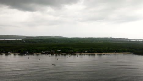 Mangrove-point-on-Nusa-Lembongan-during-cloudy-day,-aerial