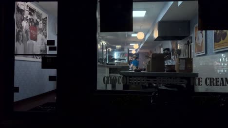 Looking-inside-a-Kilwin's-Ice-cream-shop-at-night