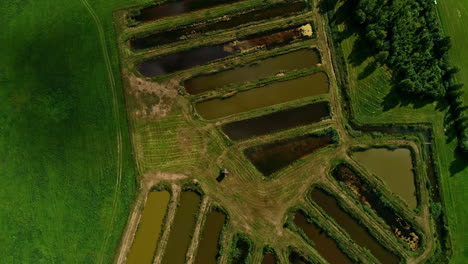 Aerial-View-Of-Small-Fish-Lake-on-the-Farm