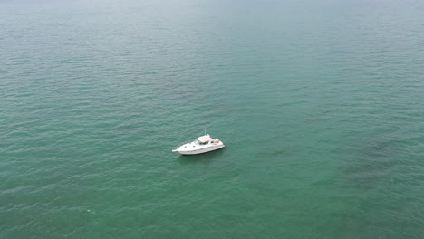 Small-Sailboat-at-sea---floating