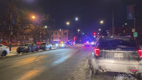 Canadian-police-car-driving-with-lights-switched-on-at-night-Montreal-Canada