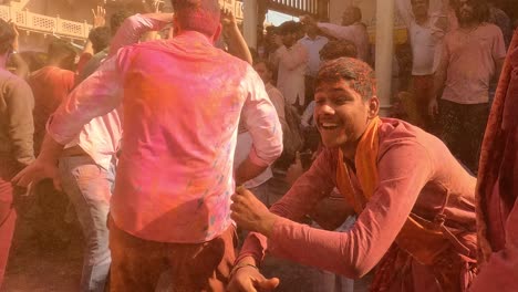 pov-shot-As-soon-as-people-come-to-the-temple,-people-are-very-enthusiastically-flying-colors-making-the-temple-and-people-very-different-colors