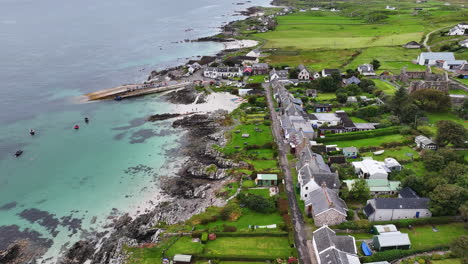 Iona,-Scotland-UK,-Aerial-View-of-Coastal-Houses-and-Island-Landscape,-Drone-Shot