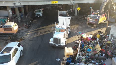 Dump-Truck-Being-Loaded-at-Construction-Site