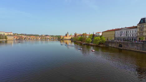 Panoramic-view-over-the-Vltava-River-with-the-sandstone-Charles-Bridge-in-the-distance
