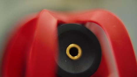 Macro-shot-of-a-shotgun-microphone,-PL-input,-red-mic-back-side,-camera-gear,-sound-record-equipment,-slow-motion-120-fps,-Full-HD,-tilt-down-smooth-movement