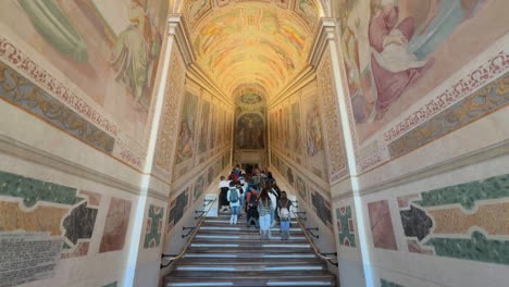 Young-Catholics-Pray-while-Ascending-the-Holy-Stairs-in-Rome,-Italy