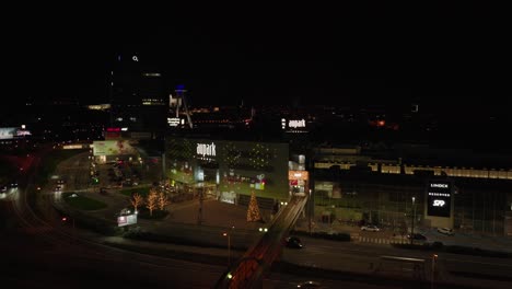 Aerial-drone-view-of-Aupark-Shopping-center-with-Christmas-lights-at-night