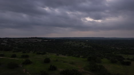 Aerial-Timelapse-of-a-cloudy-rural-landscape-during-a-total-solar-eclipse---April-8,-2024-Eclipse