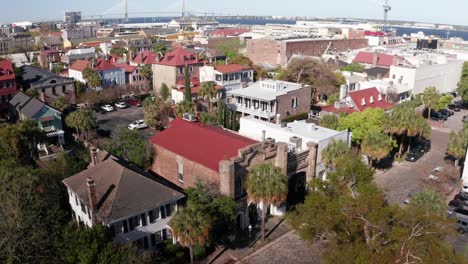 Aerial-low-close-up-shot-of-the-historic-Old-Slave-Mart-building-in-Charleston,-South-Carolina