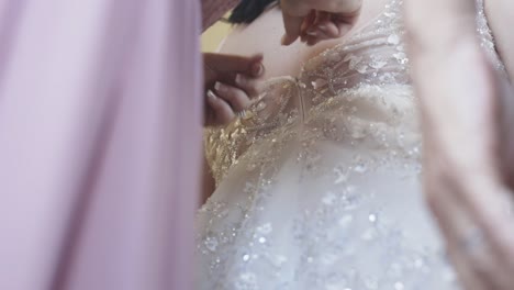 Women-help-bride-button-dress