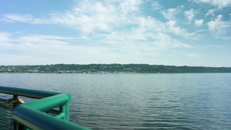 Looking-out-over-the-railing-of-a-boat-at-the-Puget-Sound