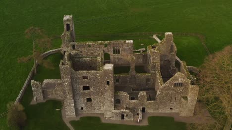 dynamic-aerial-top-down-unveils-the-ruins-of-Bective-Abbey