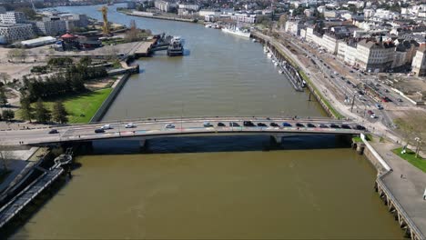 Pont-Anne-de-Bretagne-bridge-crossing-Loire-river,-Nantes-cityscape,-France