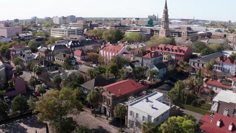 Wide-panning-aerial-shot-of-the-historic-Old-Slave-Mart-building-in-Charleston,-South-Carolina