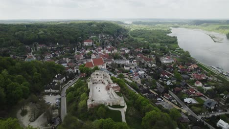 Aerial-dolley-view-of-the-city-Kazimierz-with-the-Dolny-castle-on-the-mountain-top
