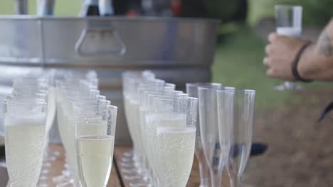Wine-glasses-sit-at-wedding