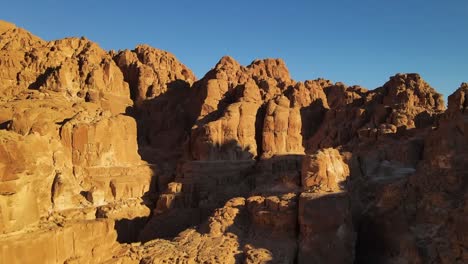 Aerial-of-the-rugged-terrain-of-Mount-Sinai-in-Sinai,-Egypt,-exemplifies-the-concept-of-natural-majesty-and-a-timeless-symbol-of-reverence-and-awe