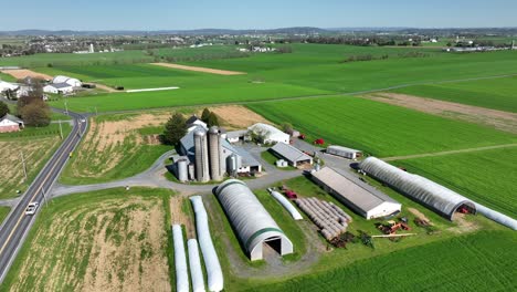 Establishing-drone-shot-of-farm-with-silo-and-stable
