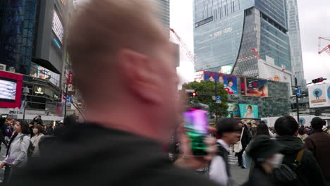 POV-Of-A-Person-Crossing-At-Shibuya-Scramble-Crossing-In-Shibuya,-Tokyo,-Japan