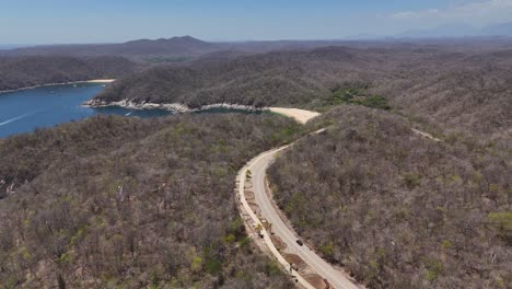 Scenic-route-to-the-mexican-pacific,-exploring-Huatulco-National-Park-from-Above