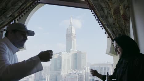 Muslim-wife-and-husband-enjoy-chai-overlooking-Mekkah