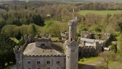 Aerial-view-of-Charleville-Castle-featuring-the-top-tower-in-foreground