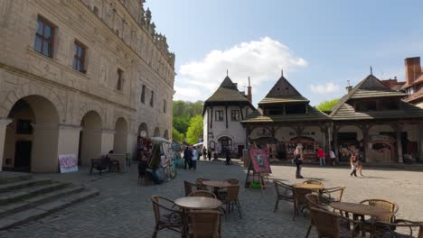 People-Tourist-sightseeing-heritage-castle-ruins-in-artistic-Market-painters-sell-artwork-at-Kazimierz-Dolny-Castle-Poland-landmark