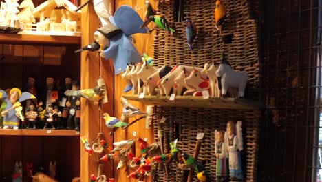 Hand-carved-souvenirs,-available-in-Krakow-Cloth-Hall,-Poland