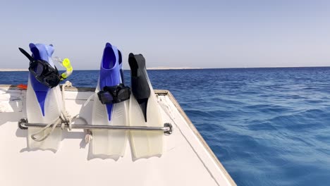 Scuba-Fins-Or-Flippers-On-Diving-Boat-In-The-Sea