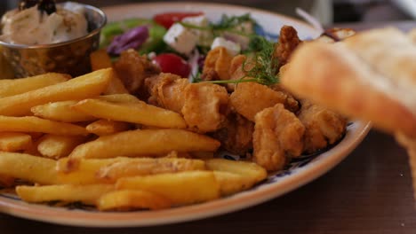 Greek-food,-fork-picks-fries
