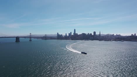 Panning-drone-shot-of-a-large-water-vessel-in-the-San-Francisco-Bay-on-nice-day