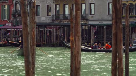 Gondolas-Sailing-Across-Grand-Canal-in-Venice