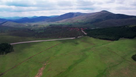 Flying-Above-Green-Landscape,-Pastures-and-Forests-of-Zlatibor-Mountain,-Serbia