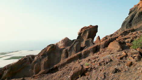 flying-inside-the-Herrera-cave-and-revealing-the-landscape-behind-the-rocks