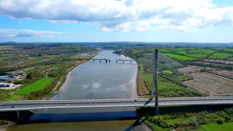 Drone-flying-over-The-Thomas-Francis-Meagher-Bridge-spanning-the-River-Suir-linking-Waterford-and-Kilkenny-cablestay-bridge-with-single-main-pylon-iconic-bridge-and-engineering