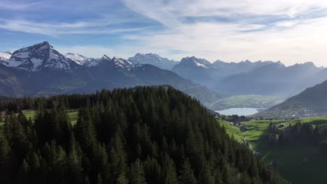 Serene-Amden-Arvenbüel-with-Alpine-Vista,-Switzerland-aerial-flyover