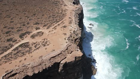 Drone-aerial-going-down-into-the-Great-Australian-Bight-with-waves