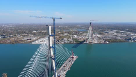 Gordie-Howe-International-Bridge-being-built-to-connect-Windsor-and-Detroit,-aerial-view