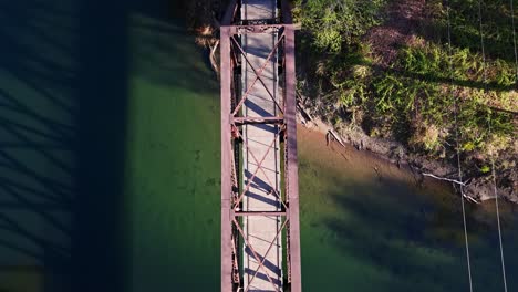 Beautiful-Bird's-eye-view-of-bridge-over-Snoqualmie-Middle-Fork-River-in-North-Bend,-Washington-State