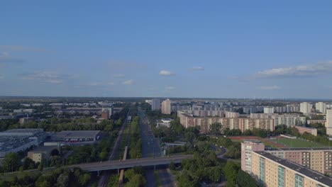 cityscape-sports-field-amidst-high-rise-buildings