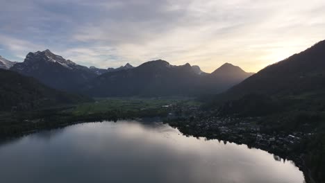 Twilight-Embrace-at-Lake-Walensee,-Swiss-Alps---aerial