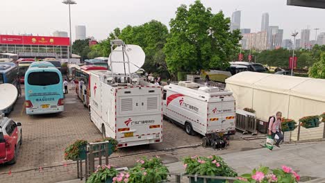 Guangzhou-radio-and-television-broadcast-trucks-parked-at-Canton-fair-complex-for-exhibition-coverage,-Guangzhou,-China