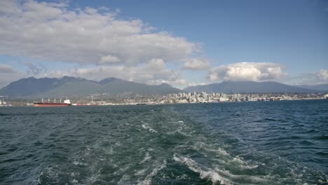 Wake-Splashing-Behind-Boat-Cruising-Away-From-North-Vancouver-In-Canada