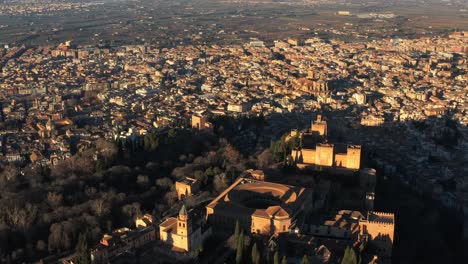 Aerial-Retreat-Tourist-Attraction-Alhambra-in-Granada-Spain,-City-on-the-Background-During-Sunny-Summer-Day
