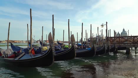 Gondolas-floating-near-the-harbor-of-Venice