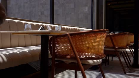 Front-view-of-stylish-and-light-dining-table-in-restaurant-close-up-shot,low-angle-shot